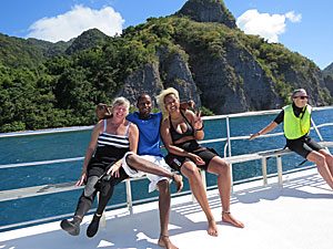 divers, snorkelers and staff during a surface interval